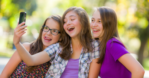 pre-teens taking a selfie 3